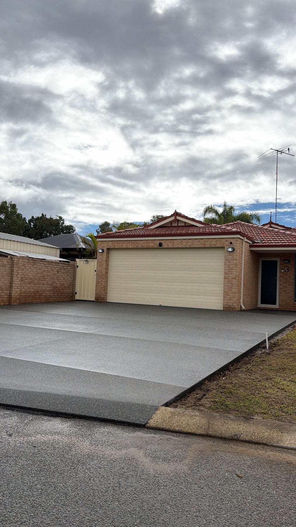 Concrete driveway and garage approach