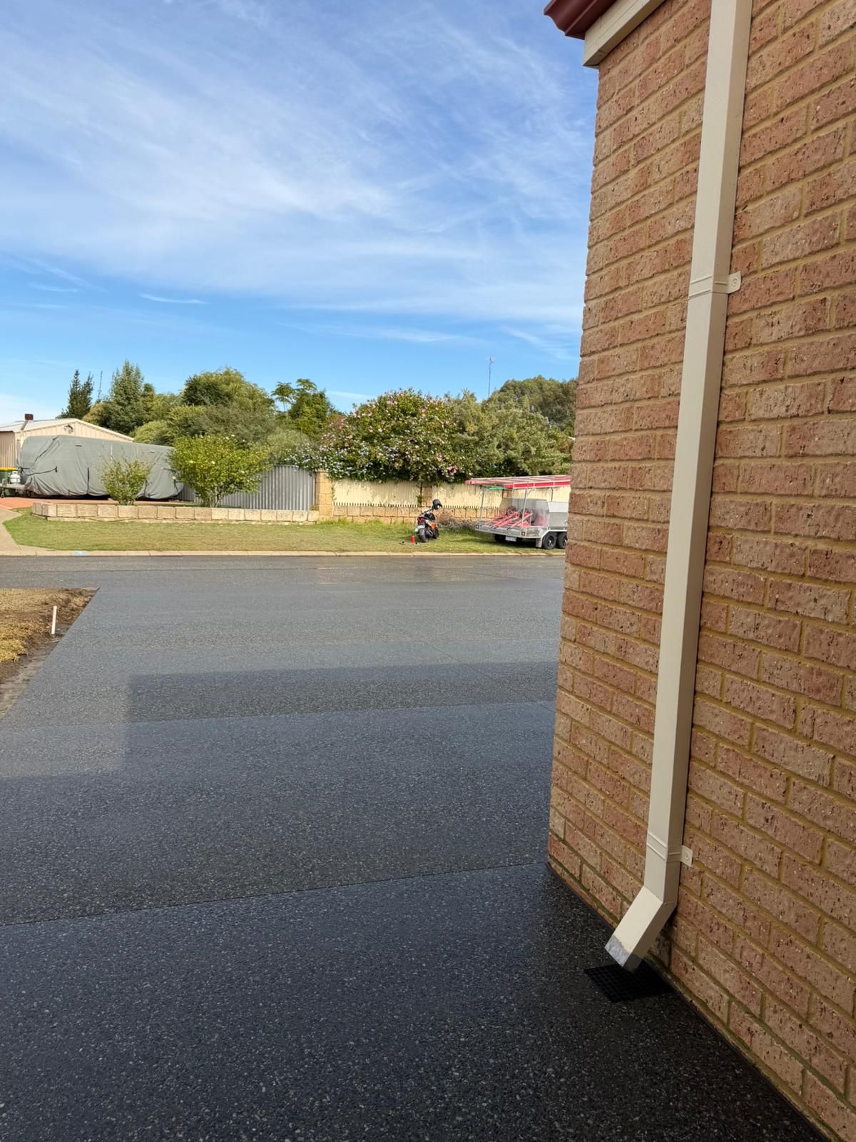 Exposed aggregate path beside home
