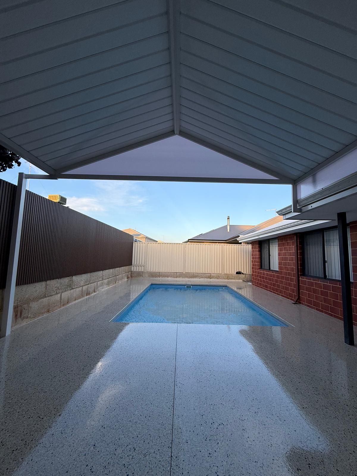 Pool surround with alfresco patio